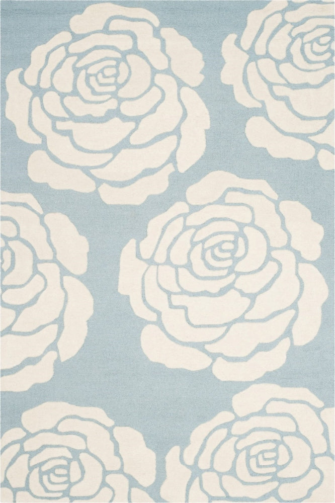 LIGHT BLUE FLORAL HAND TUFTED CARPET