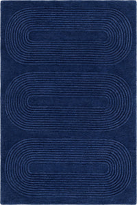 A dark blue textured area rug featuring three large, vertically aligned oval patterns with concentric ribbed details.
