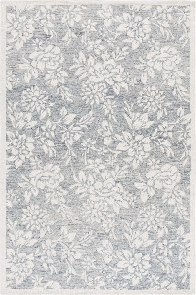 Floral patterned rug with white flowers on a gray background