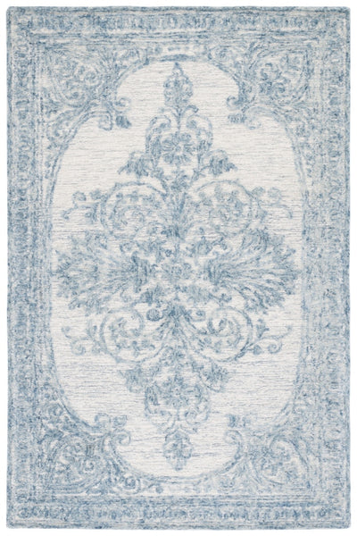 BLUE TRANSITIONAL HAND TUFTED RUG