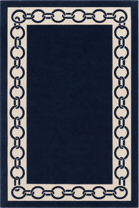 A rectangular navy blue rug with a cream border featuring a repeating interlocking chain-link pattern.
