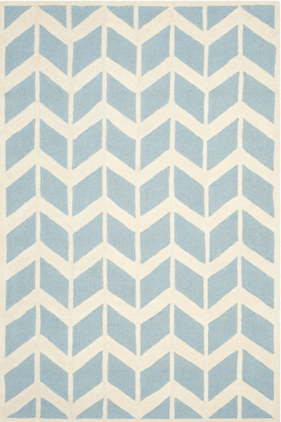 BLUE AND WHITE CHEVRON HAND TUFTED CARPET