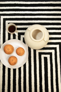 BLACK AND IVORY GEOMETRIC HAND TUFTED CARPET CLOSEUP by Imperial Knots