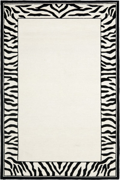 IVORY AND BLACK GEOMETRIC HAND TUFTED CARPET