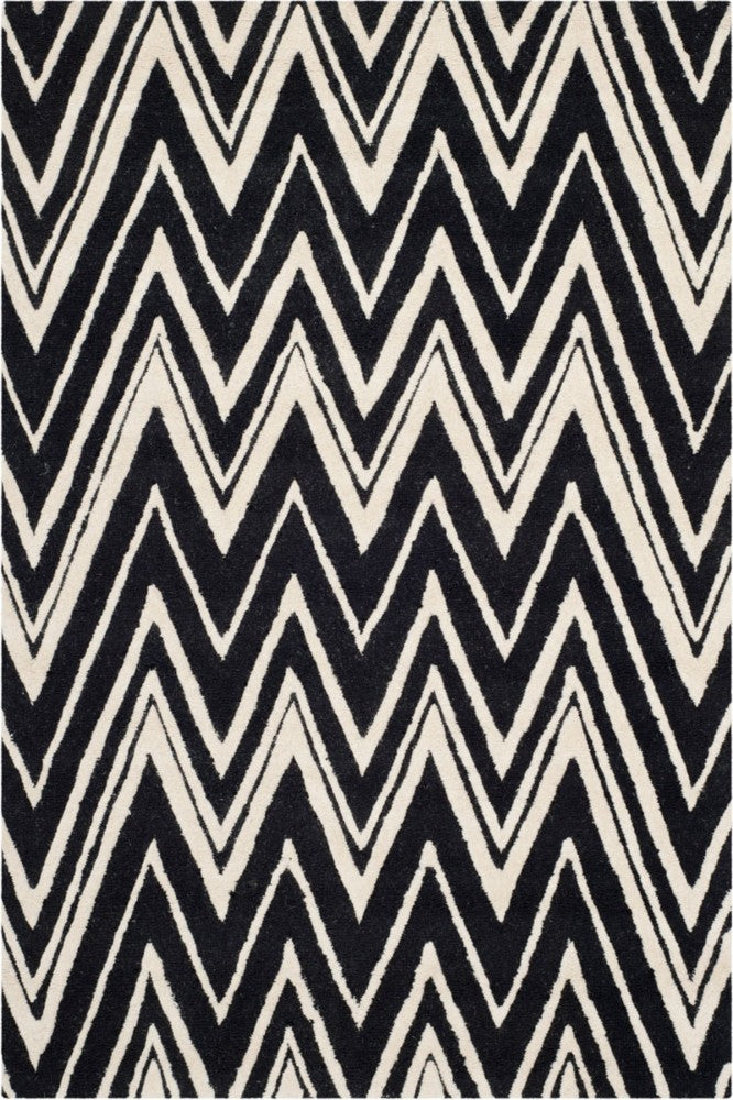BLACK AND IVORY CHEVRON HAND TUFTED CARPET
