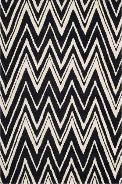 BLACK AND IVORY CHEVRON HAND TUFTED CARPET