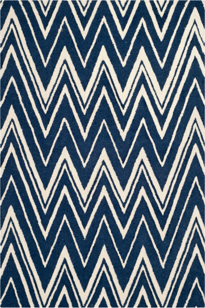 BLUE AND IVORY CHEVRON HAND TUFTED CARPET