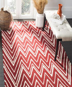 RED AND IVORY CHEVRON HAND TUFTED CARPET