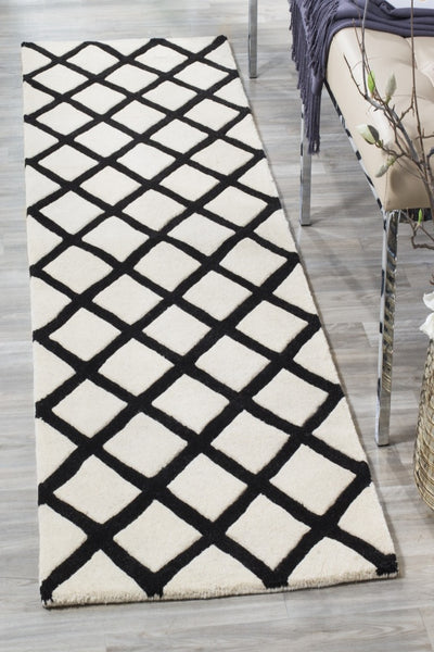IVORY AND BLACK GEOMETRIC HAND TUFTED RUNNER