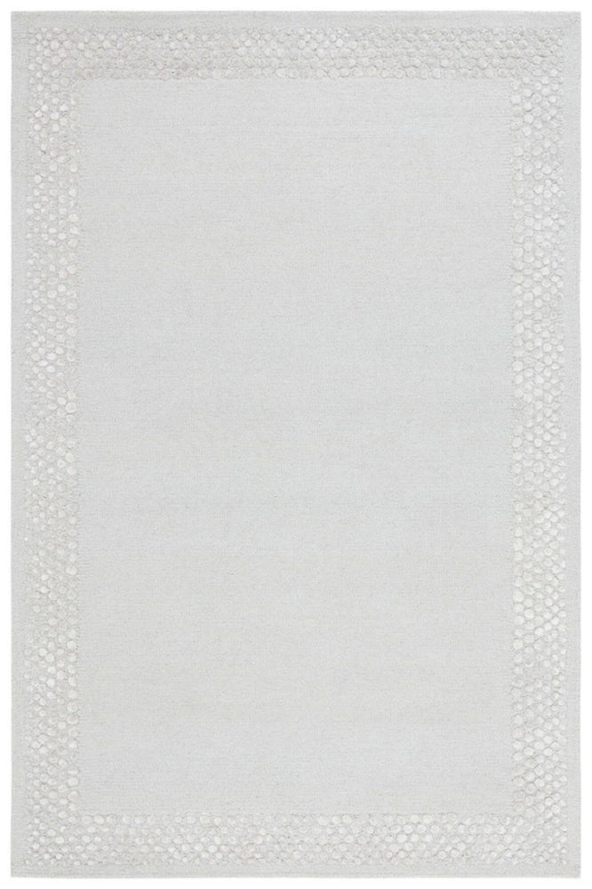SILVER GREY SOLID HAND TUFTED CARPET