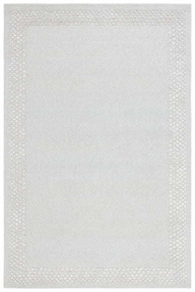 SILVER GREY SOLID HAND TUFTED CARPET