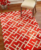 RED DIP DYED LINKS HAND TUFTED CARPET