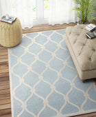 BLUE AND WHITE GEOMETRIC HAND TUFTED CARPET