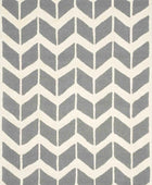 GREY AND IVORY CHEVRON HAND TUFTED CARPET