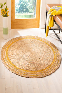 YELLOW AND NATURAL ROUND JUTE HAND WOVEN DHURRIE by Imperial Knots - Image 1