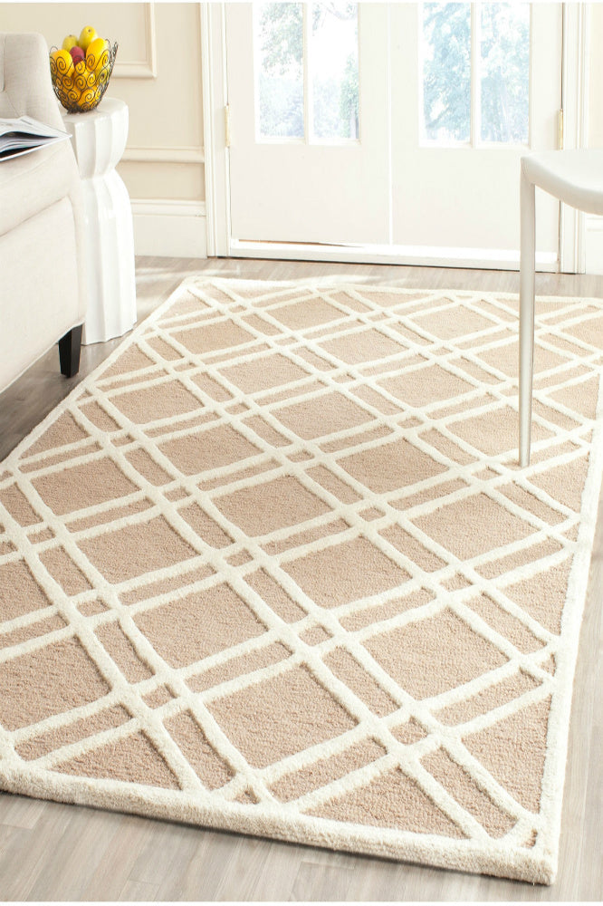 BROWN AND IVORY GEOMETRIC HAND TUFTED CARPET