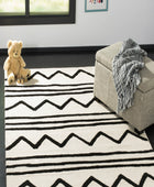 BLACK AND IVORY KIDS HAND TUFTED CARPET