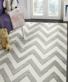 GREY AND IVORY CHEVRON HAND TUFTED CARPET