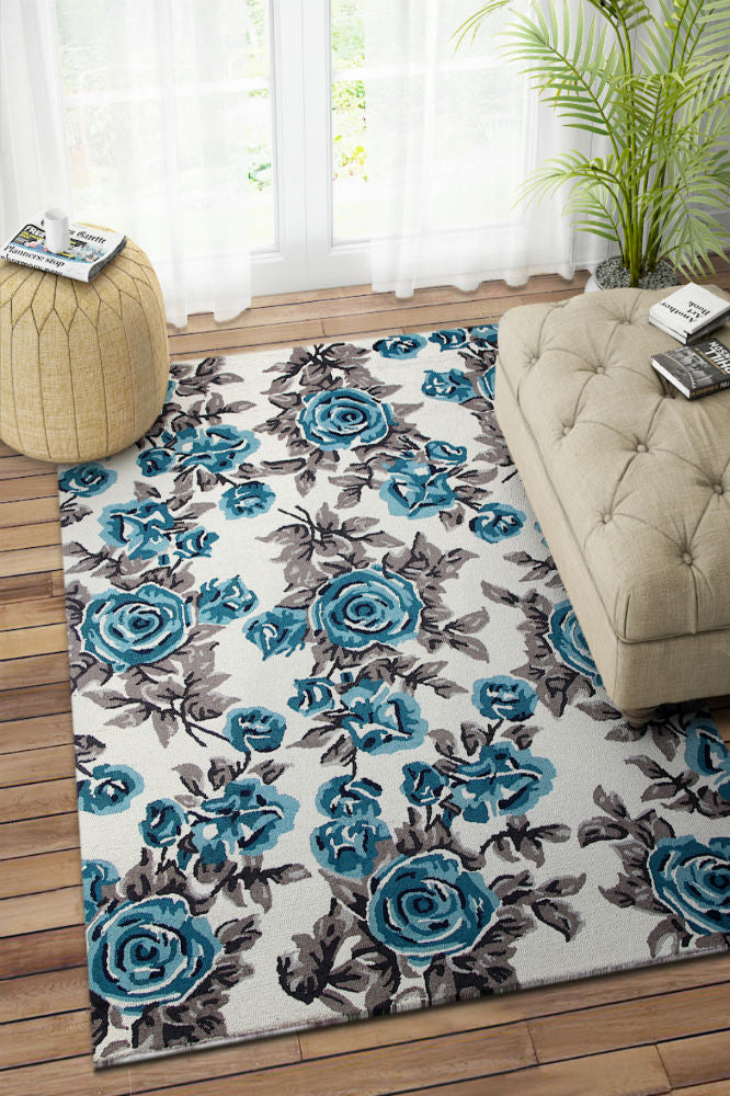 BLUE AND IVORY FLORAL HAND TUFTED CARPET