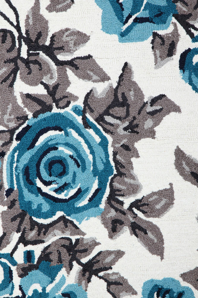 BLUE AND IVORY FLORAL HAND TUFTED CARPET